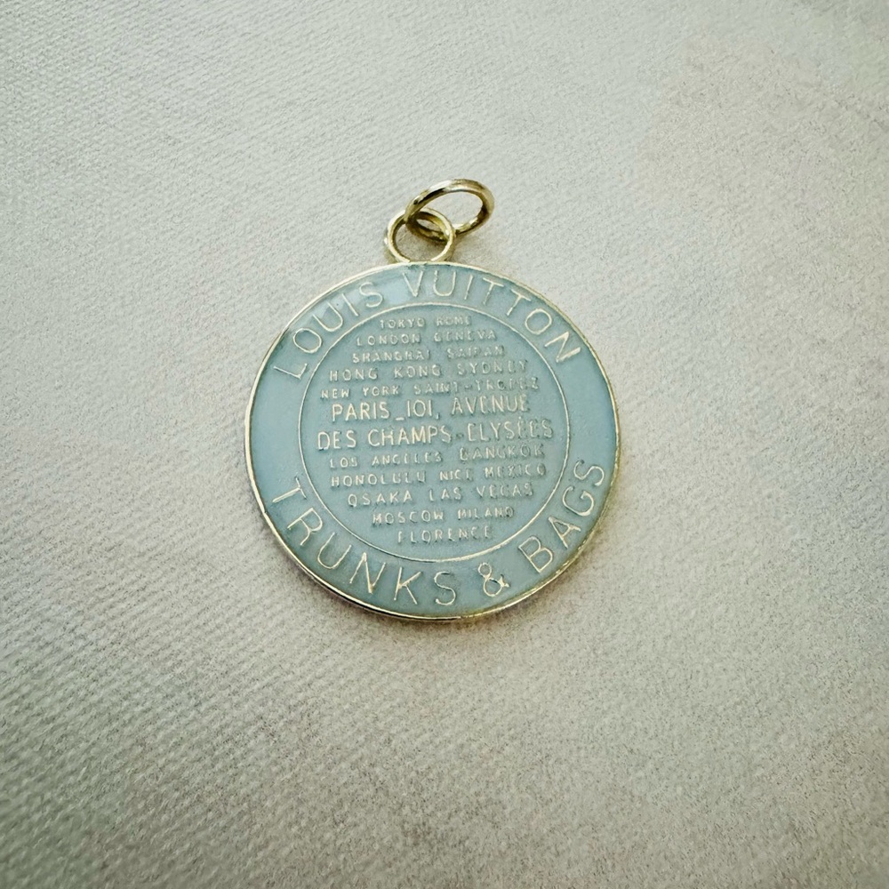 Louis Vuitton Gold & pastel blue “Trunks & Bags” large pendant Medallion jewelry